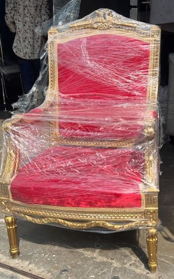 red cushioned wooden royal throne chairs