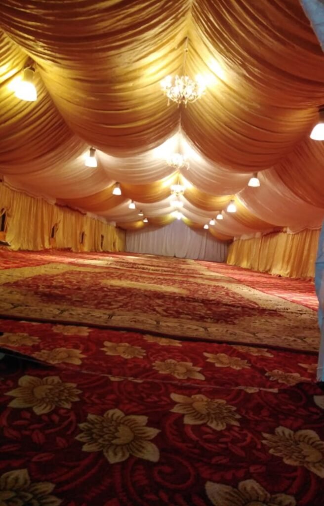 vacant party hall with red carpet and lights