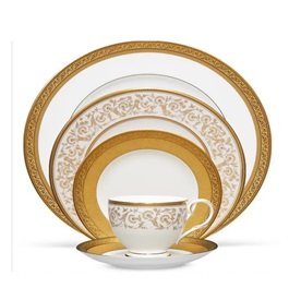 gold plates with cup and saucer