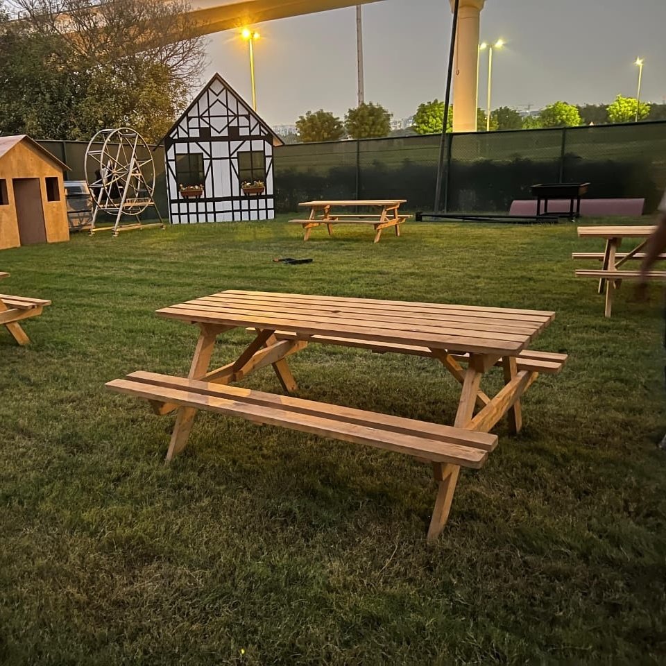 Picnic bench rental in Dubai with neat outdoor seating arrangement